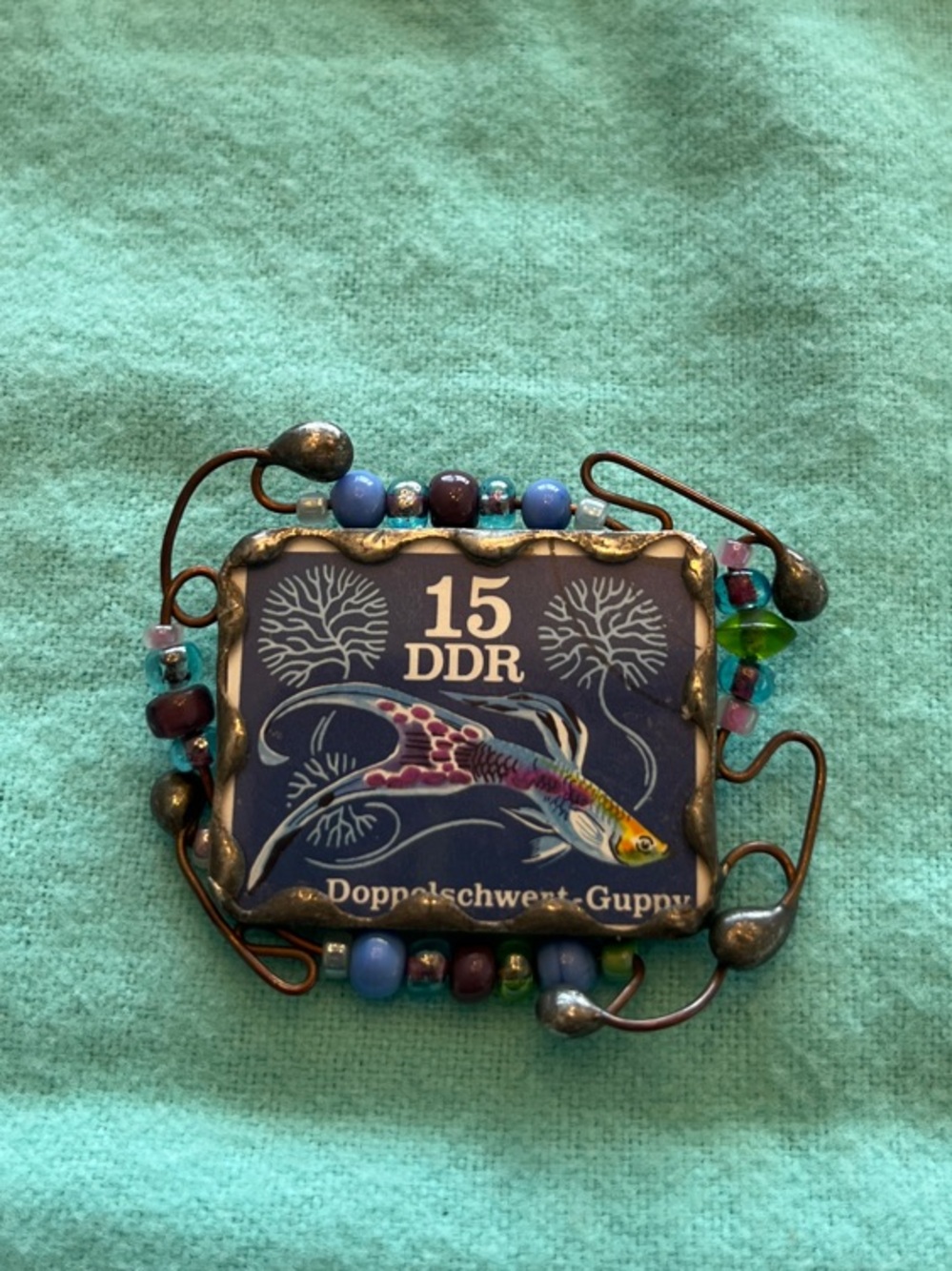 Funky handmade brooch with German stamp and beads
